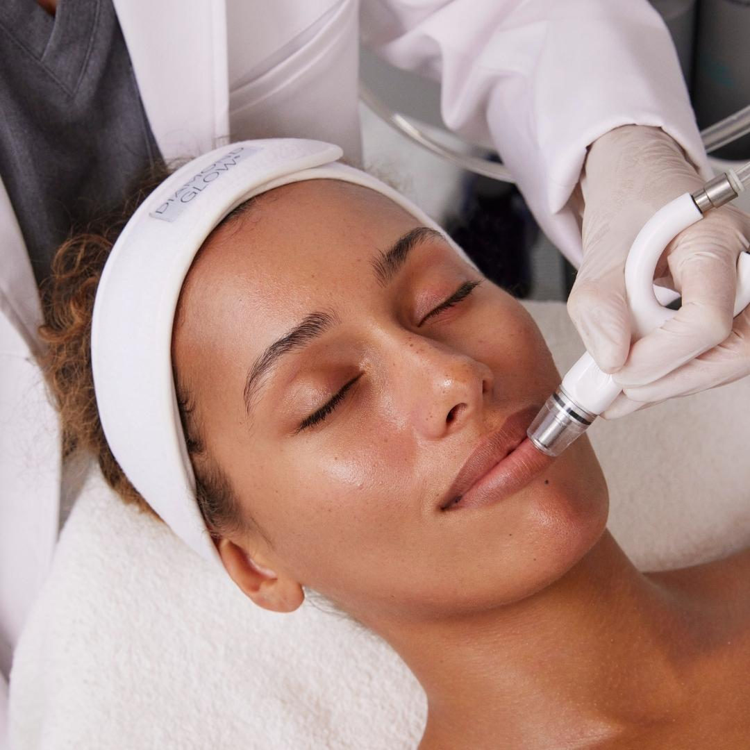 A DiamondGlow treatment being performed on a patient’s face