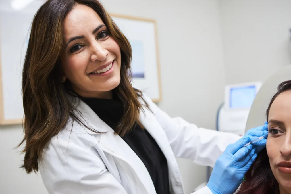 Dr. Shanthi Colaço with a patient at ShanthiMD Dermatology in Los Angeles