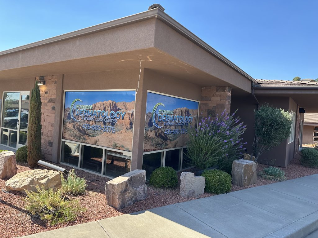 Exterior of the St. George Dermatology office with its window signage